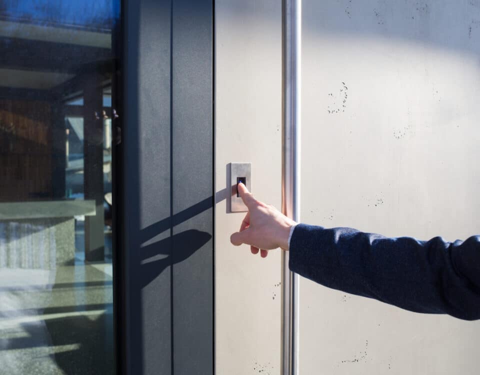 Biometric attendance tracking software in use upon door entry to building