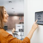 Woman using a physical access control system