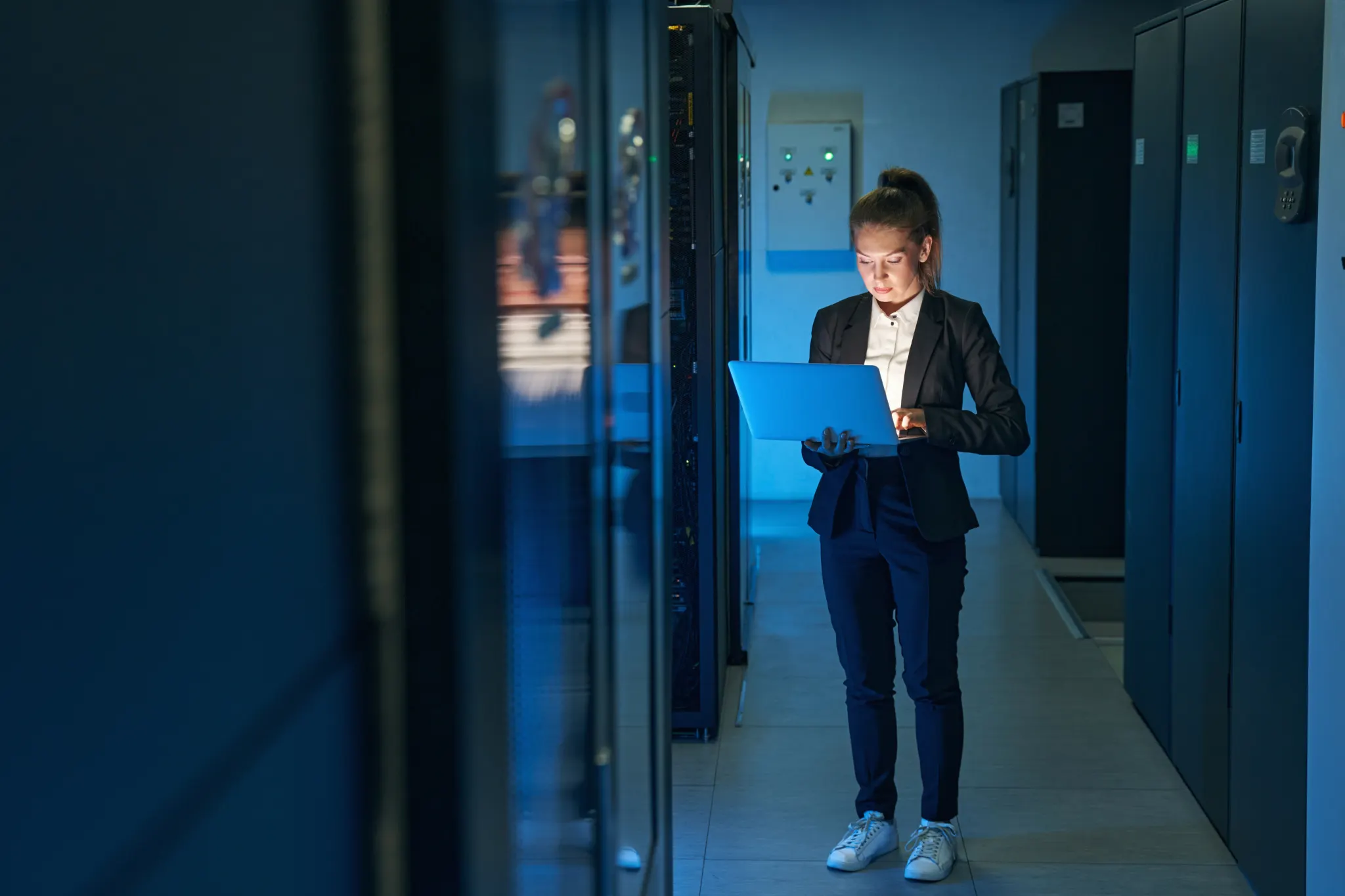 Administrator in a company server room running NCheck on-premises